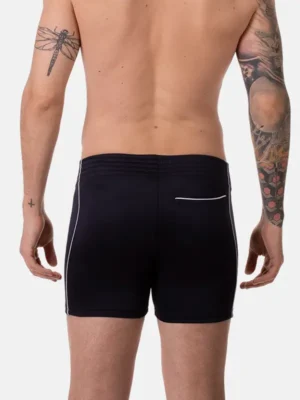 Vista trasera del short deportivo Barcode Berlin Aluk en azul marino, con detalle de bolsillo trasero y costuras blancas.