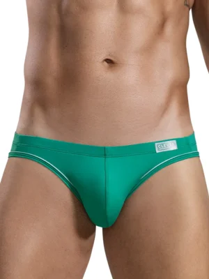 Vista frontal del Slip Clever Mirage Piping en verde, detalle del diseño ergonómico y piping.