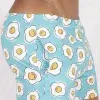 bañador corto Sweet Banana Eggs azul turquesa con estampado de huevos vista frontal