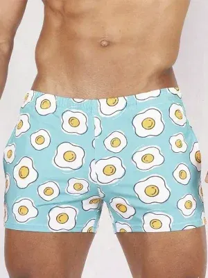 bañador corto Sweet Banana Eggs azul turquesa con estampado de huevos vista frontal