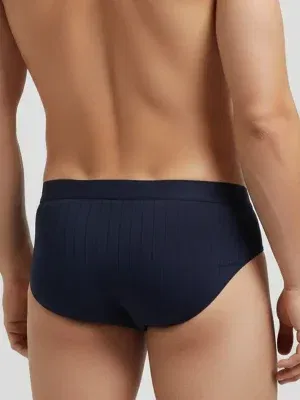 Slip hombre azul marino canalé con cintura tonal águila centrada