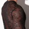 Top de encaje transparente de manga larga negro