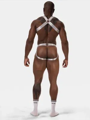 Vista trasera suspensorio jockstrap hombre plateado tiras elásticas y glúteos definidos