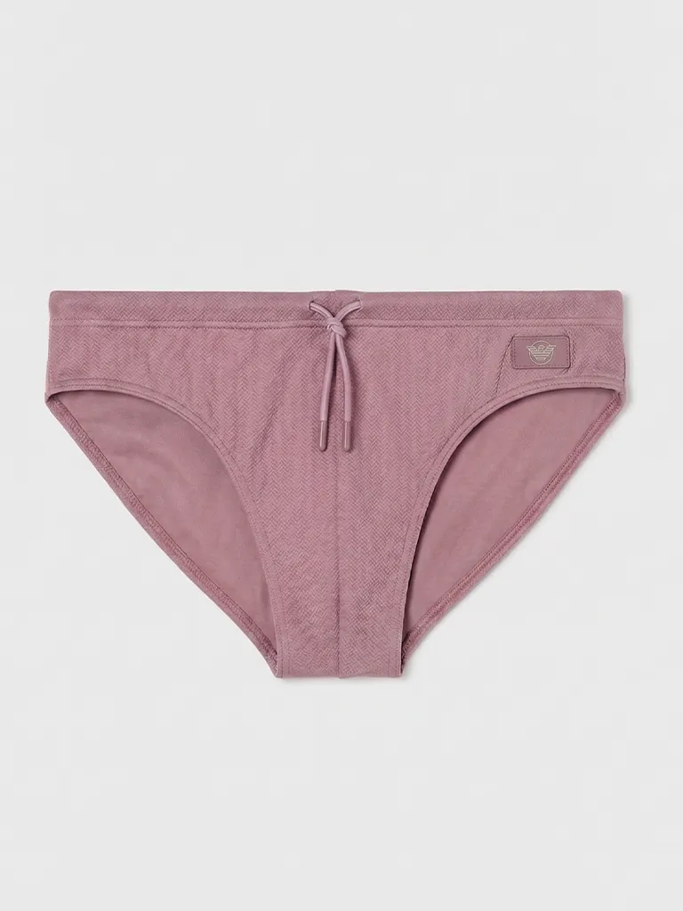 Bañador slip Emporio Armani Espiga Old Rose sobre fondo gris