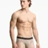 Slip hombre arena/taupe Emporio Armani, cinturilla chocolate con etiqueta águila centrada, vista frontal.