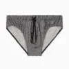 Bañador slip Emporio Armani Stripe Nut beige y negro con microáguila bordada