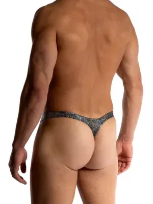 Vista trasera del Tower String Manstore M2511 negro plata con línea limpia y perfil reducido.