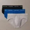 Pack 3 slips hombre negro azul gris Calvin Klein Cotton Stretch cinturilla con logo vista frontal.