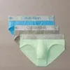 Pack 3 slips Calvin Klein Micro Stretch MTA (LV00NB4122), negro blanco menta, vista producto.