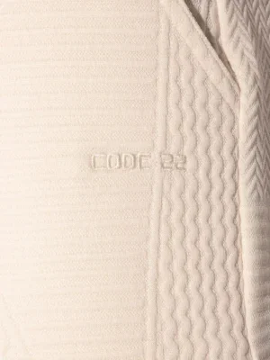 Detalle bolsillo trasero y logo bordado tono sobre tono en pantalón largo Off White Code 22 Medley