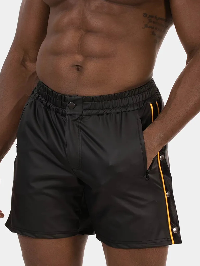 Detalle frontal del short Barcode Berlin Fuad negro amarillo con bolsillo de cremallera
