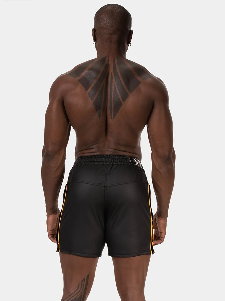Vista trasera del short Fuad negro amarillo de Barcode Berlin con cinturilla elástica