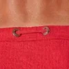 Primer plano ojales metálicos Code 22 grabados sobre tejido waffle rojo — New York Bikini Rojo