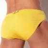 Vista posterior lateral bañador mini slip Code 22 Amsterdam Amarillo con hebilla trasera