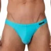 Detalle frontal de bañador slip azul turquesa con logo lateral y corte Sunbrief — BLU2551 Olaf Benz