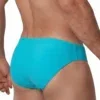 Vista trasera lateral de bañador slip liso azul turquesa con corte Sunbrief — BLU2551 Olaf Benz
