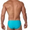 Vista trasera lateral de bañador slip liso azul turquesa con corte Sunbrief — BLU2551 Olaf Benz