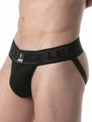 Vista lateral del Suspensorio Leader Sport Mesh Negro mostrando cinturilla jacquard tonal de 60 mm con texto LEADER en relieve y tejido mesh frontal.