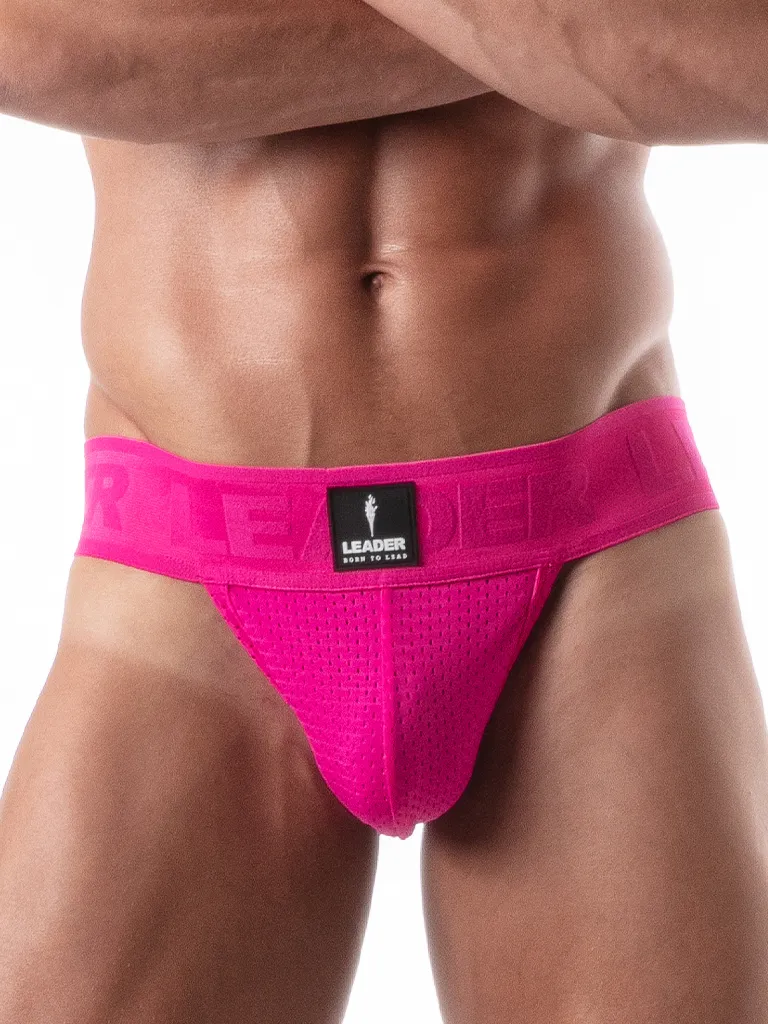 Vista frontal del Suspensorio Leader Sport Mesh Rosa con bolsa de mesh perforado fucsia y parche LEADER Born To Lead negro sobre cinturilla jacquard.