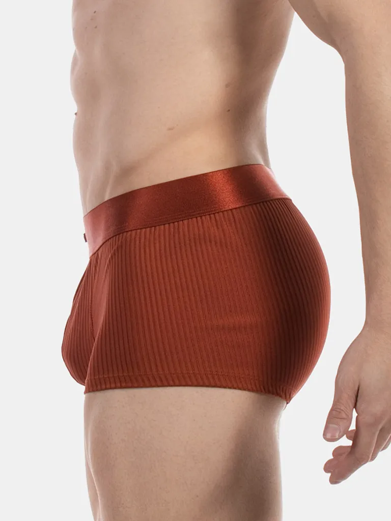 Vista lateral del boxer óxido Stellan de Barcode Berlin con cobertura trasera