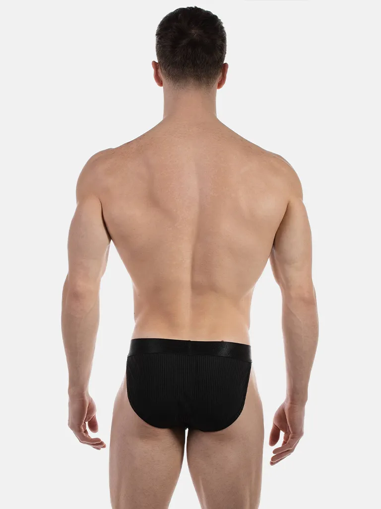 Vista trasera del slip bikini negro Viggo de Barcode Berlin