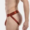 Vista lateral del jockstrap óxido Barnabie de Barcode Berlin con tiras traseras