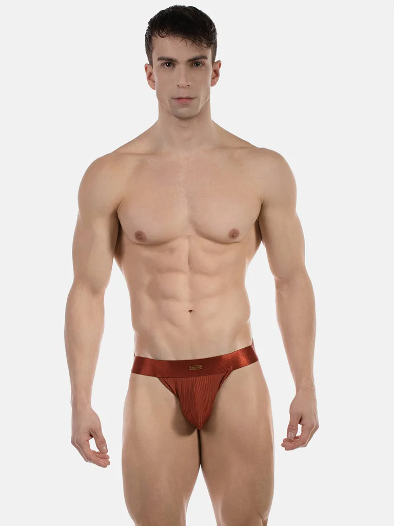 Hombre de frente con jockstrap color óxido de canalé Barnabie de Barcode Berlin