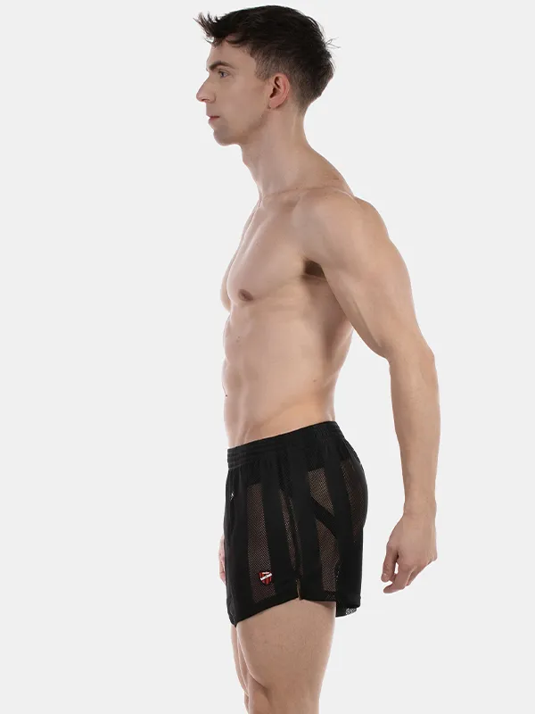 Vista lateral del short de rejilla negro Mikkel de Barcode Berlin