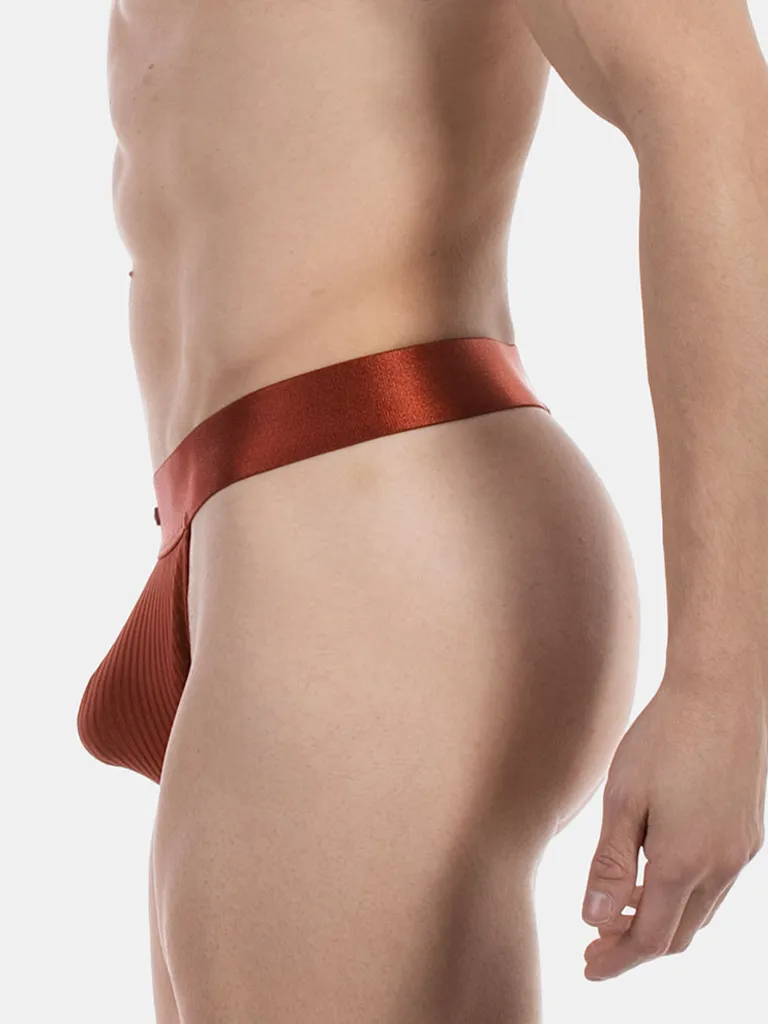 Vista lateral del tanga hombre óxido Julian de Barcode Berlin con cintura elástica